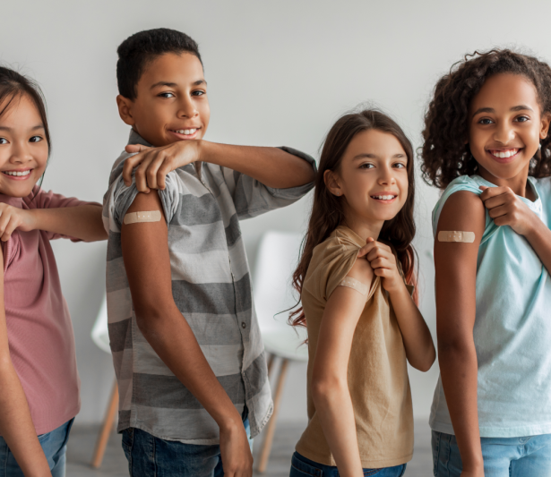 kids showing arm after injection